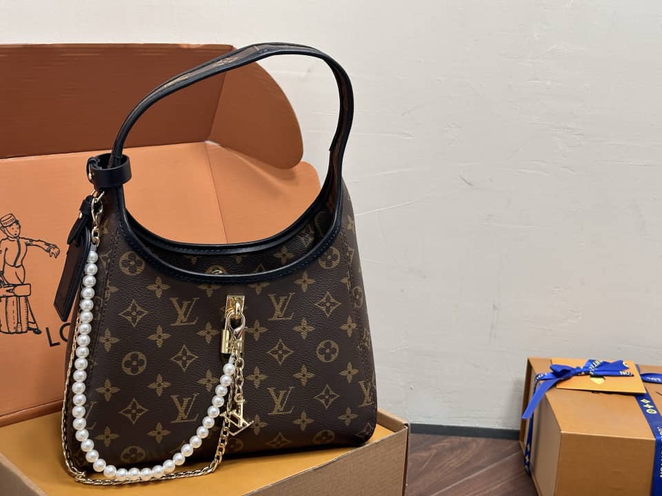 Drop PM Handbag – Monogram Canvas with Gold Padlock Accent