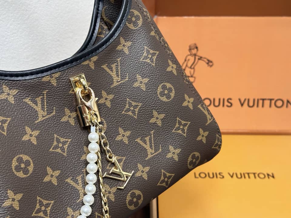 Drop PM Handbag – Monogram Canvas with Gold Padlock Accent