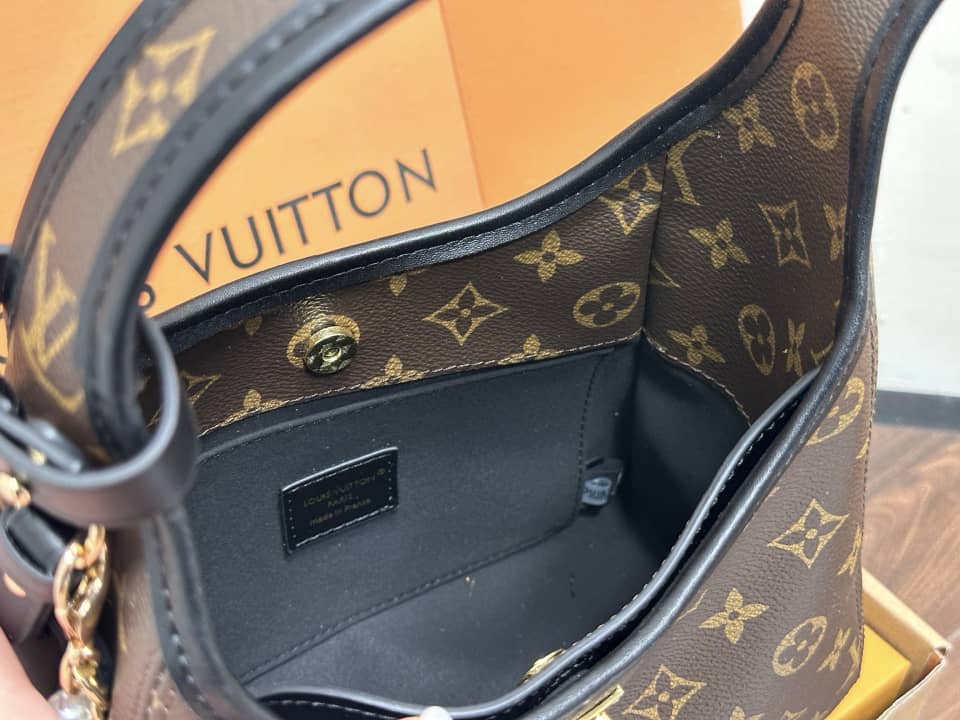 Drop PM Handbag – Monogram Canvas with Gold Padlock Accent