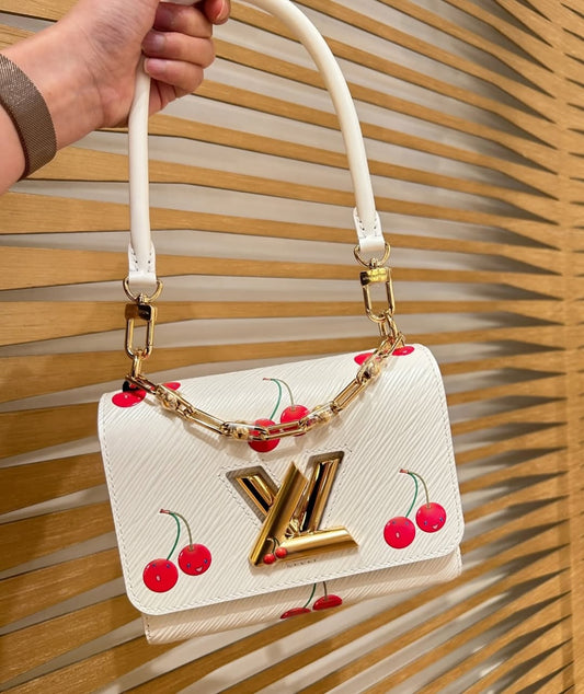 LV x TM Twist PM Bag – White Epi Leather with Cherry Motif & Gold Chain
